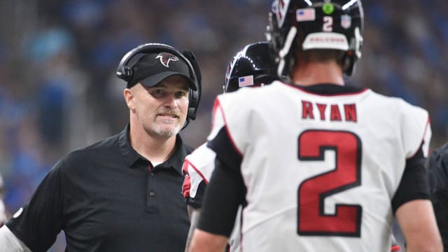 Sep 24, 2017; Detroit, MI, USA; Atlanta Falcons head coach Dan Quinn high fives quarterback Matt Ryan (2) during the fourth quarter against the Detroit Lions at Ford Field.